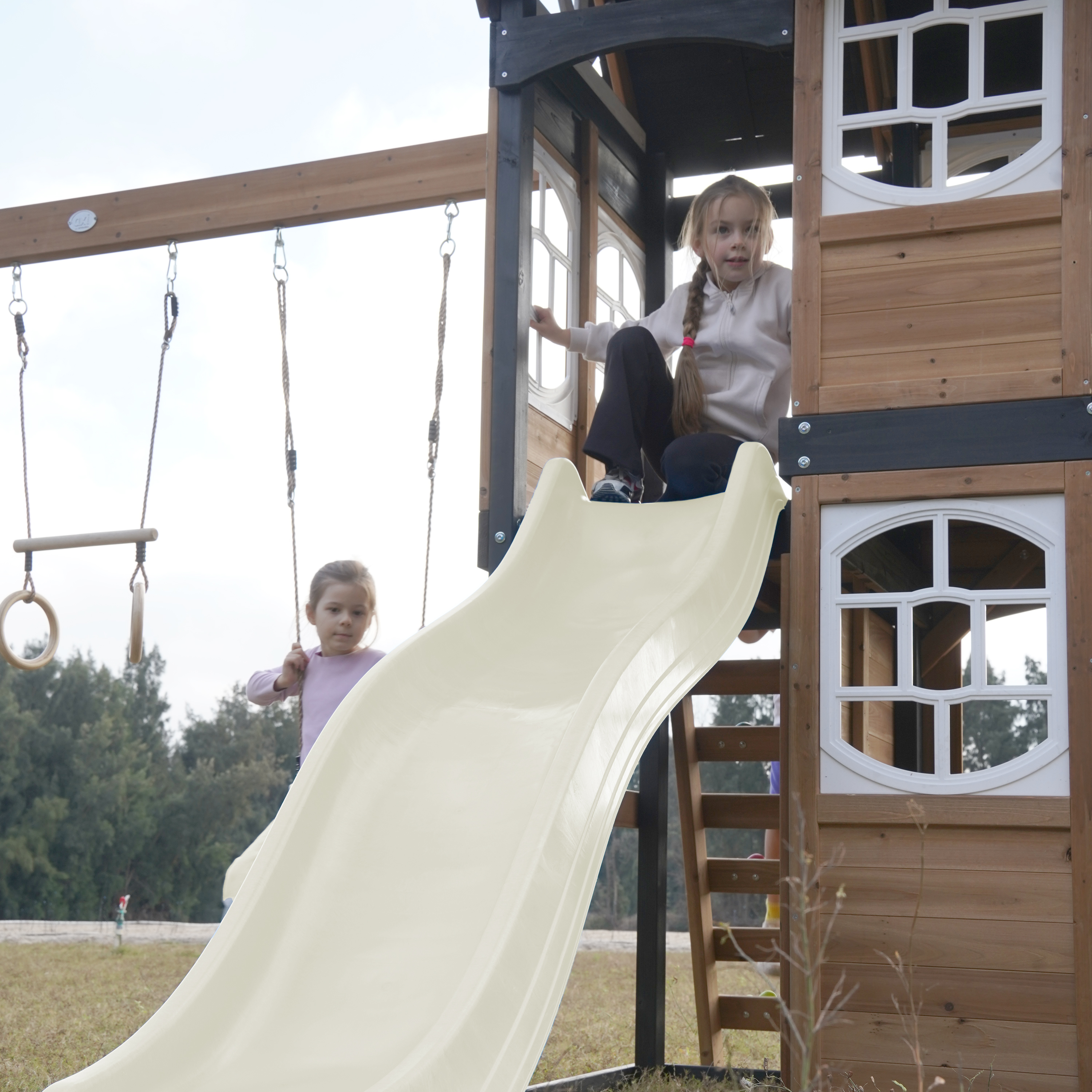 AXI Noud Climbing Frame with Playhouse. Swings. Trapeze and Climbing Wall – Cream Slide and Tube Slide